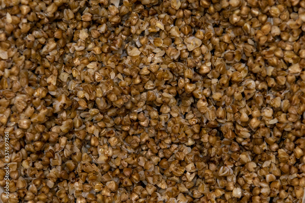 boiled buckwheat closeup. Food in quarantine from the coronavirus. Background and texture boiled buckwheat closeup. Food in quarantine from the coronavirus. Background and texture