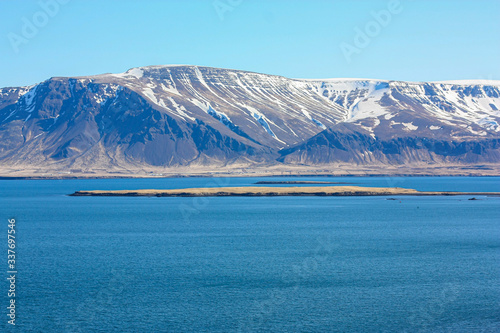 snow-covered majestic mountains near the ocean. The Landscape Of Iceland