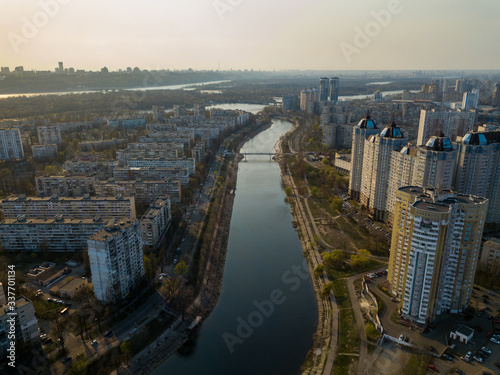 Residential area Rusanovka in Kiev in the evening sunshine. Aerial drone view.