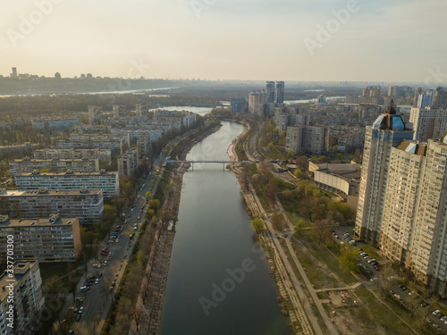 Residential area Rusanovka in Kiev in the evening sunshine. Aerial drone view. photo