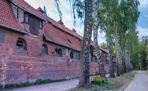 фотографія Brick buildings at the Kwidzyn Horse Stud.