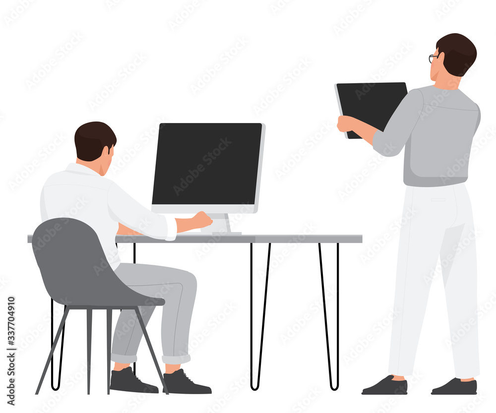 Two men work on gadgets. Two men work on gadgets.
