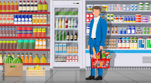 Supermarket store interior with goods. Big shopping mall. Interior store inside. Customer with basket full of food. Grocery, drinks, fruits, dairy products. Vector illustration in flat style