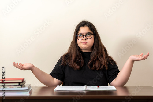 13 years old girl doing homework	