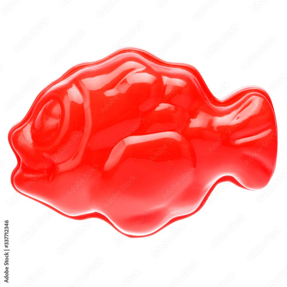 Red plastic fish on a white background, close-up. Children's toys for bathing babies. Educational games for children, preschool education. Layout, preparation of toys for the designer or website Red plastic fish on a white background, close-up. Children's toys for bathing babies. Educational games for children, preschool education. Layout, preparation of toys for the designer or website