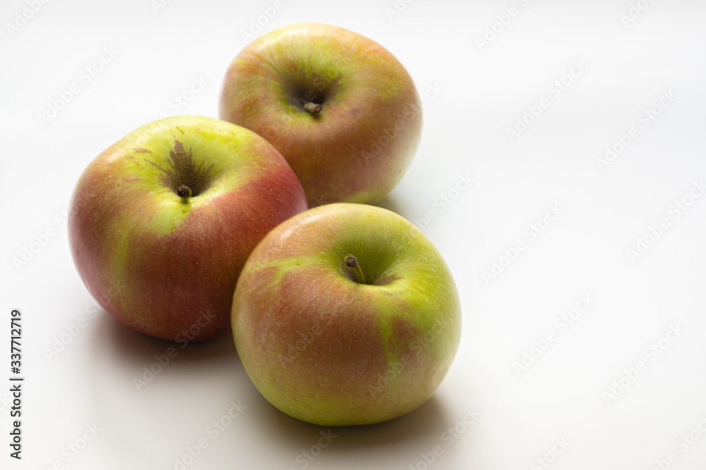 A ripe Apple shot from above on a white background A ripe Apple shot from above on a white background
