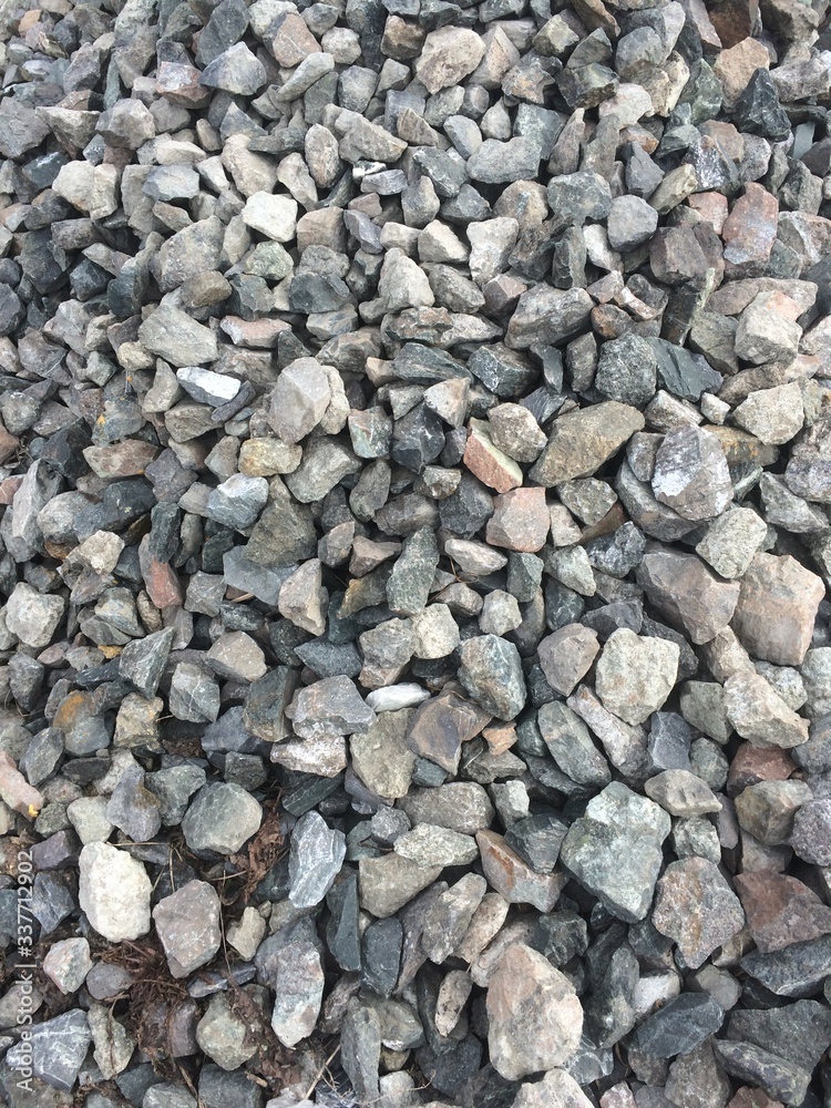 background of scattered large rough stones background of scattered large rough stones