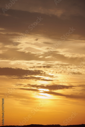 Amazing summer sunshine. Colorful sunshine sky at golden hour time. © AlemTMA