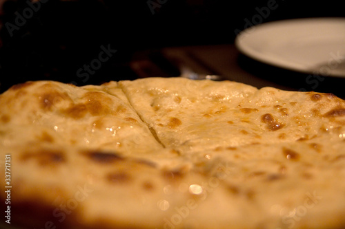 Indian sweet bread with coconut and honey