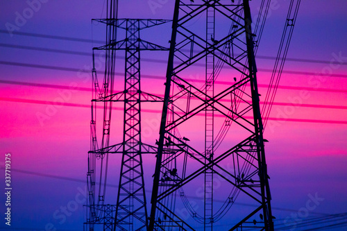 Φωτογραφία Electricity poles and high voltage transmission