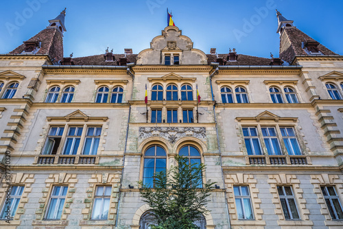 Facade of Town Hall in historic part of Sighisoara city, Romania