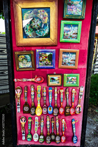Unique traditional romanian gifts, paintings, spoons and palettes with different symbols.