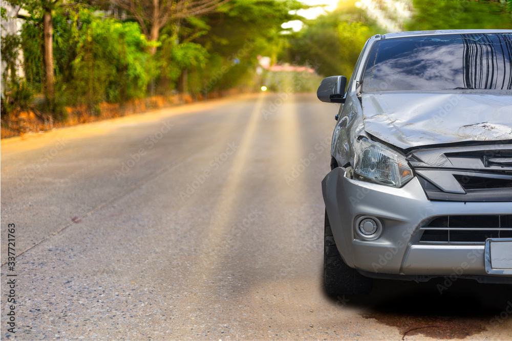 Front of light gray color car with pick up have big damaged and broken by accident on road in morning time can not drive any more park for wait insurance officer. With copy space for text or design Front of light gray color car with pick up have big damaged and broken by accident on road in morning time can not drive any more park for wait insurance officer. With copy space for text or design