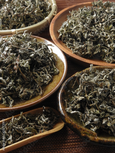 High angle view of dry mugwort on plate. Be used to ward off evil spirits and to drive away mosquitoes during the Dragon Boat Festival in Taiwan.  Chinese herbal medicine.