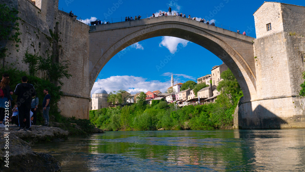 Mostar / Bosnia & Herzegovina - April 2019: People Mostar Bridge (Stari Most). Old Mostar Bridge full of tourists.