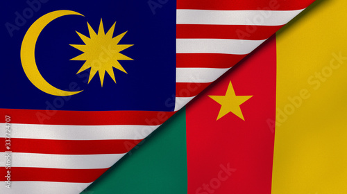 The flags of Malaysia and Cameroon. News, reportage, business background. 3d illustration photo