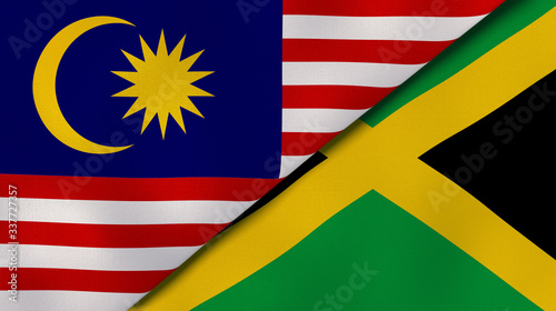 The flags of Malaysia and Jamaica. News, reportage, business background. 3d illustration photo