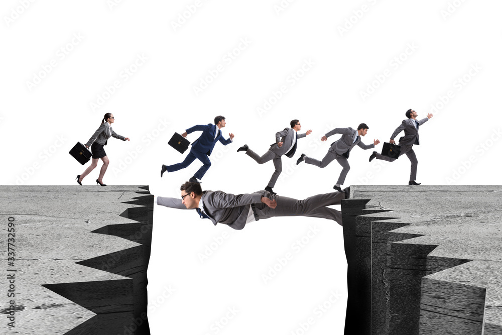 Businessman acting as a bridge in support concept Businessman acting as a bridge in support concept