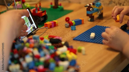 Little girl online learning and creating at home. Quarantine and Social distancing concept.