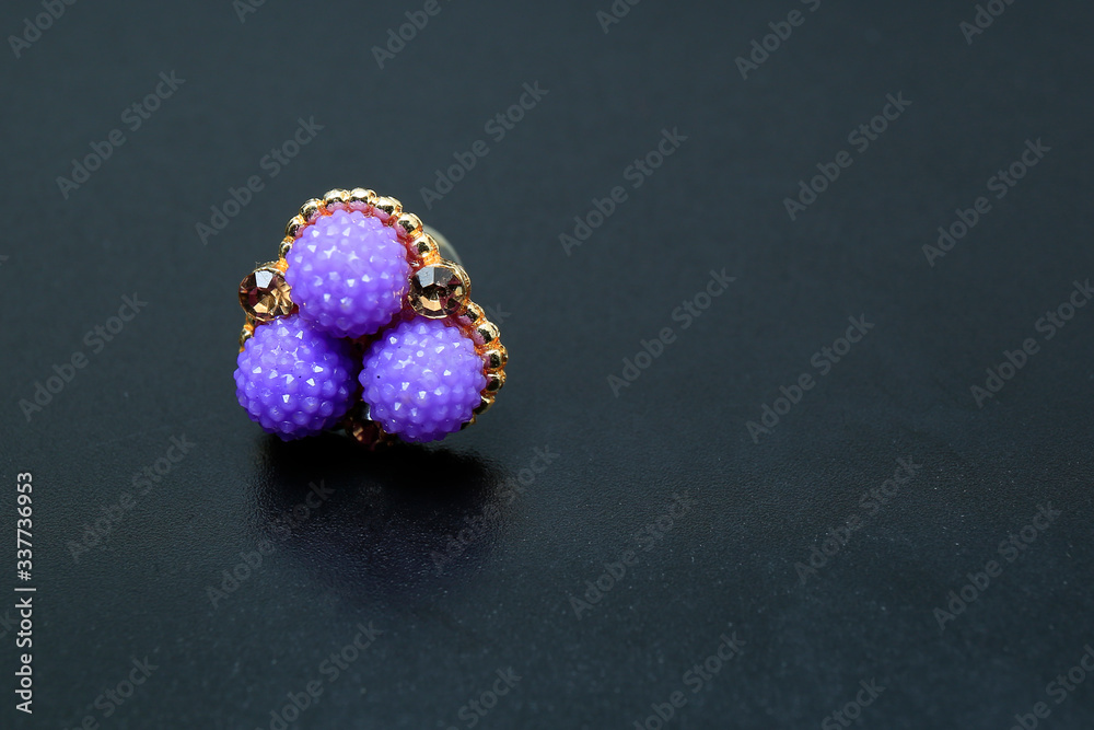 Beautiful Ear ring on black background Beautiful Ear ring on black background