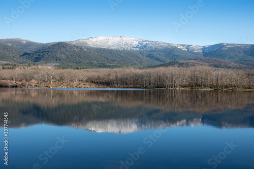 Ponton Reservoir in Segovia; Castilla y Leon, Spain; Europe. Nice reflection in the water of the landscape surrounding the reservoir.