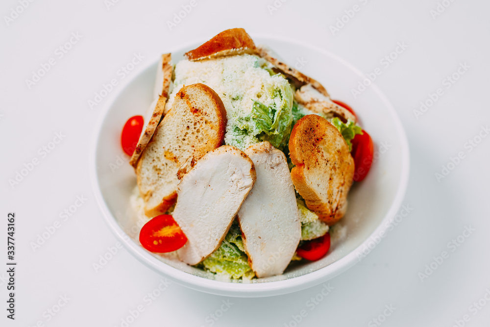 tomato and chicken salad, healthy food isolated on white background
