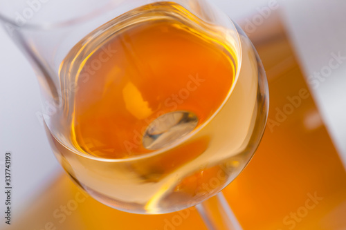 glasses and bottles with orange wine