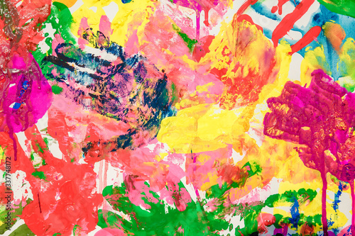 Colorful painted hand prints on white background