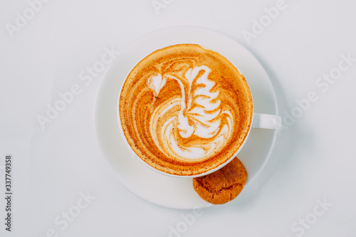 cup of cappuccino with a pattern, coffee on a white background