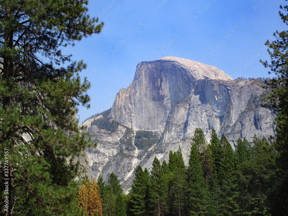 View of the Half Dome, one of the most iconic mountain of Yosemite National Park, in California, USA