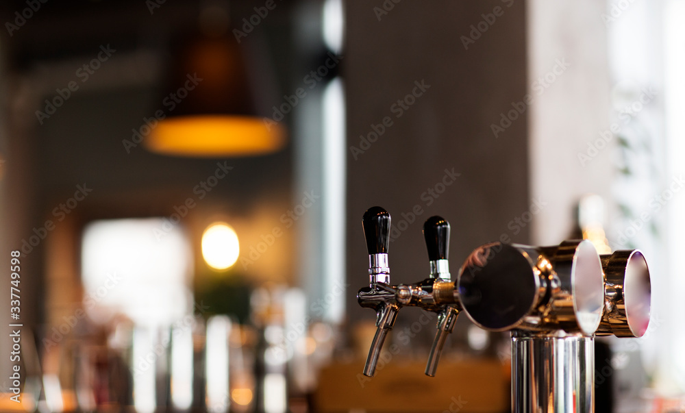 Beer tap in restaurant, lager beer and craft beer