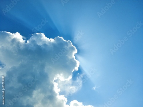 Sunrays through cloud