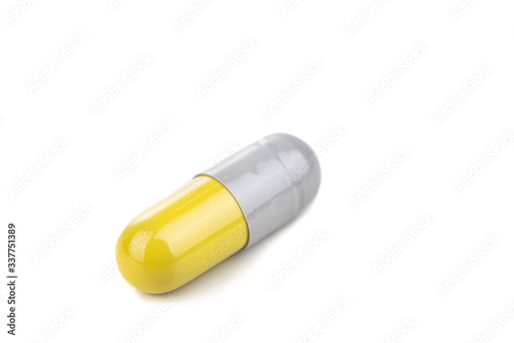 Close-up of medicine in capsule format on white background