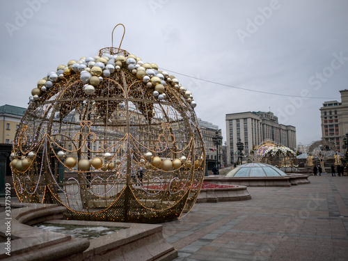 Decoration of the Manege square in the form of Golden balls. The structure is decorated with many balls.