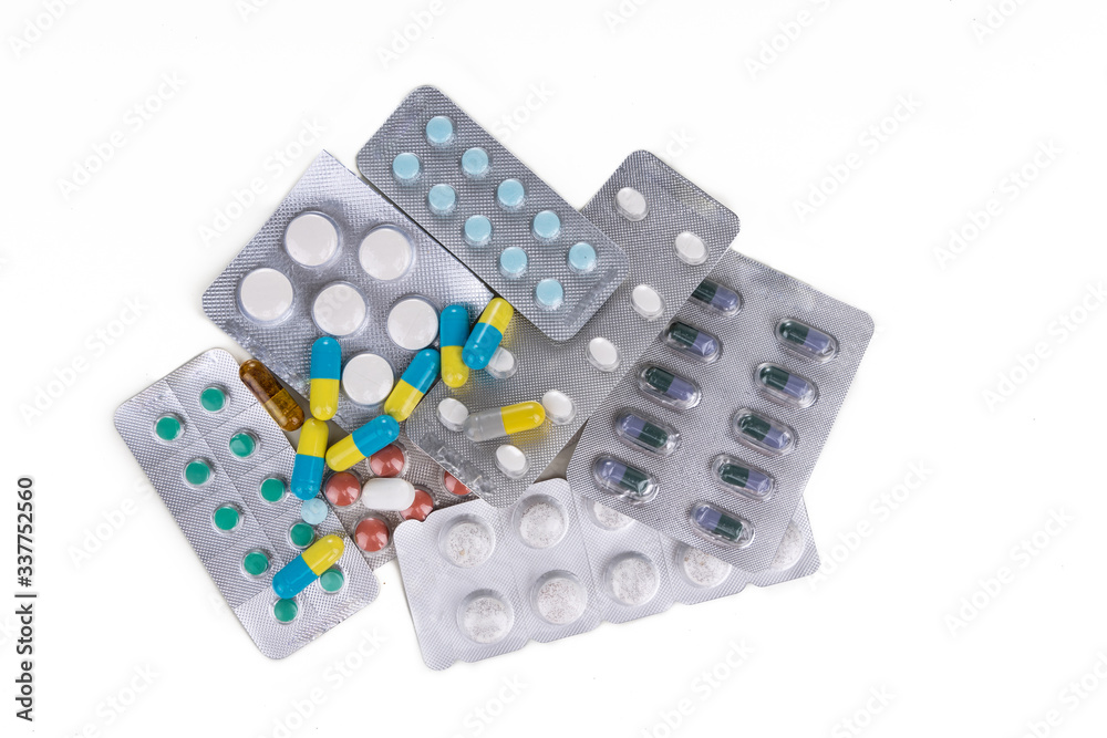 Overhead view of multiple strips of pills tablet, caplet, capsule. Medication for various disease. Overhead view of multiple strips of pills tablet, caplet, capsule. Medication for various disease.