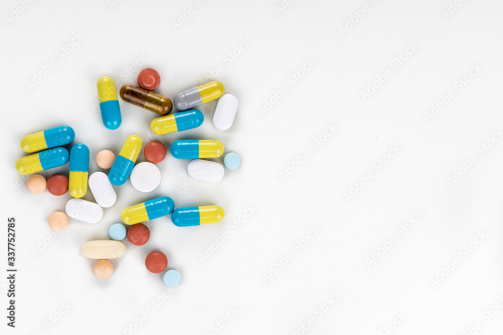 Overhead view of multiple pills tablet, caplet, capsule. Medication for various disease.