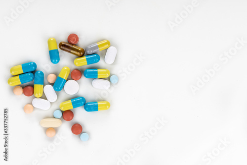 Overhead view of multiple pills tablet, caplet, capsule. Medication for various disease.