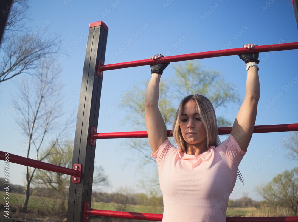 Fototapeta premium Woman Exercising in the Park