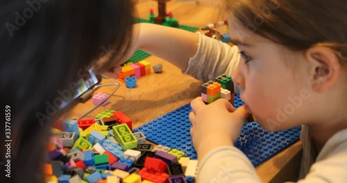 Little girl online learning and creating at home. Quarantine and Social distancing concept.