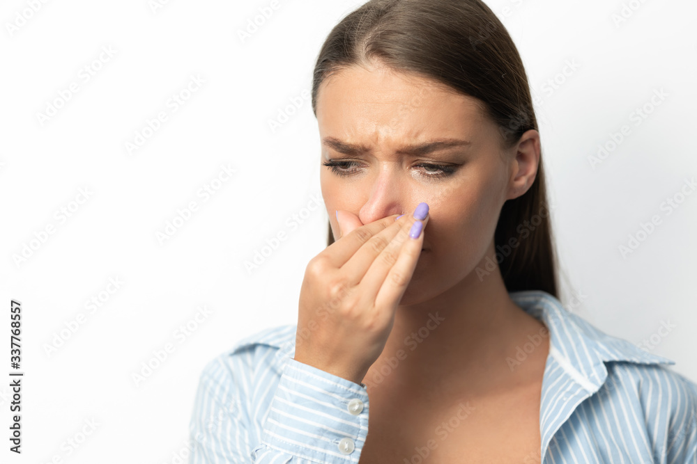Sick Woman Having Runny Nose Standing Over White Background Sick Woman Having Runny Nose Standing Over White Background