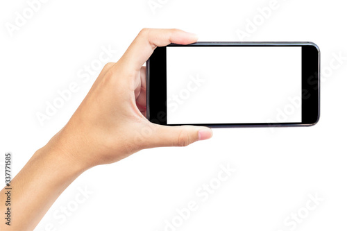 Hand holding mobile smart phone with blank screen. Isolated white background and clipping path.