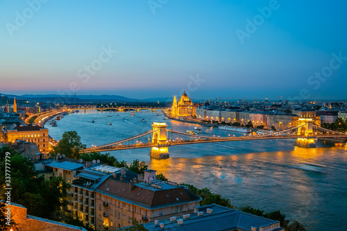 Panoramic of Chain Bridge and Parliament in Budapest at dusk