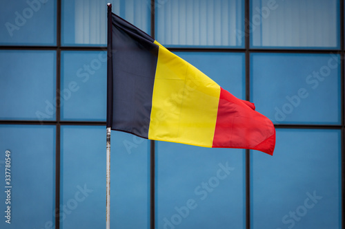 German flag on the background of building glazing