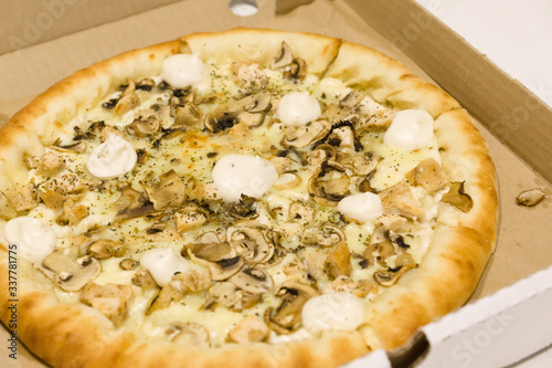 big pizza with mushrooms