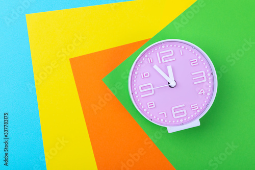 Clock on a colorful background
