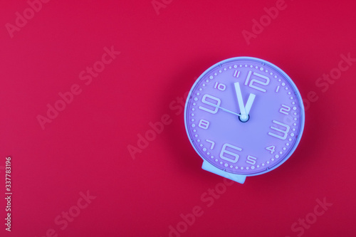 Clock on red wall