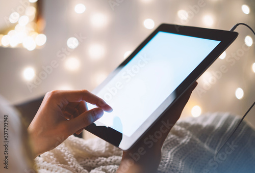 workplace at home relax, girl working tablet technology, solation student study computer with blank screen mockup,  female hands holding gadget, online wifi internet photo