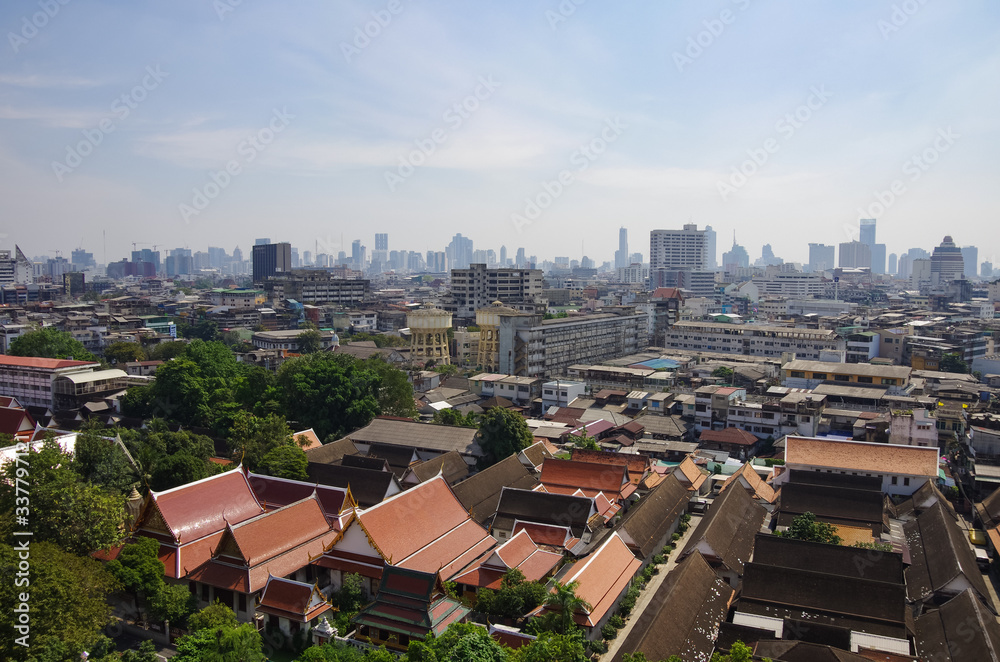 Panorama with pagodas, the old city buildings and skyscrapers downtown. Bangkok. Thailand