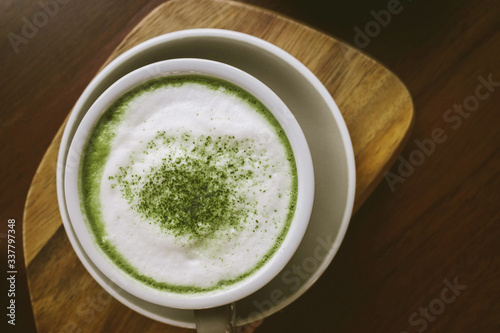 Green tea matcha on wooden table