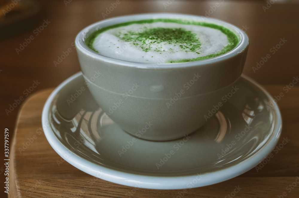 Green tea matcha on wooden table Green tea matcha on wooden table